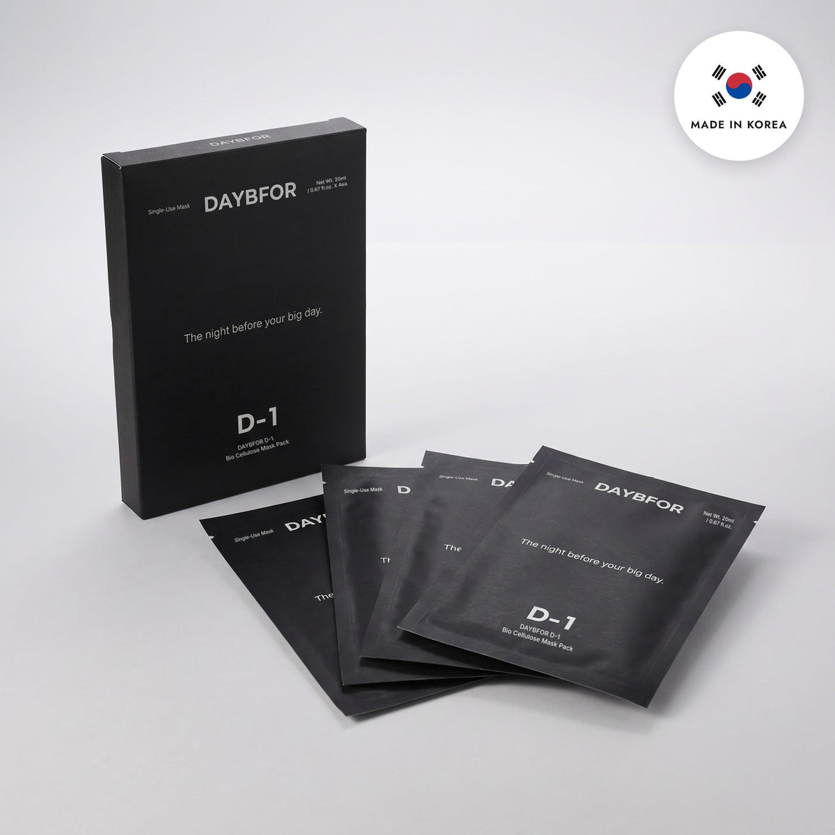A black DAYBFOR D-1 box and four individual mask pouches on a light background.