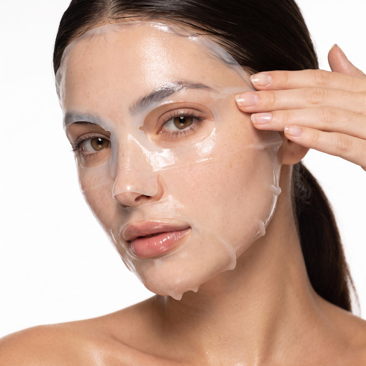 A woman using the D-1 sheet mask