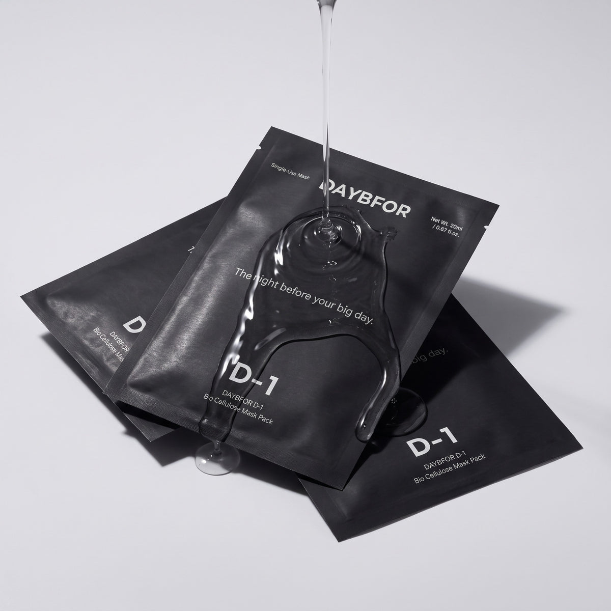 DAYBFOR D-1 pouches with clear essence poured over them